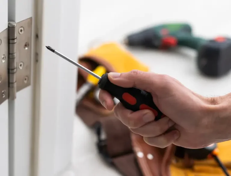 a-locksmith-is-repairing-an-interior-door-lock-cl-2025-01-08-15-17-44-utc.webp